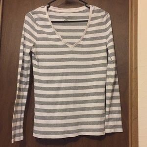 Striped long sleeve v-neck shirt.